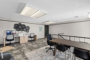 A conference room with a long table and chairs at Delphine on Diamond, San Francisco, CA 94131